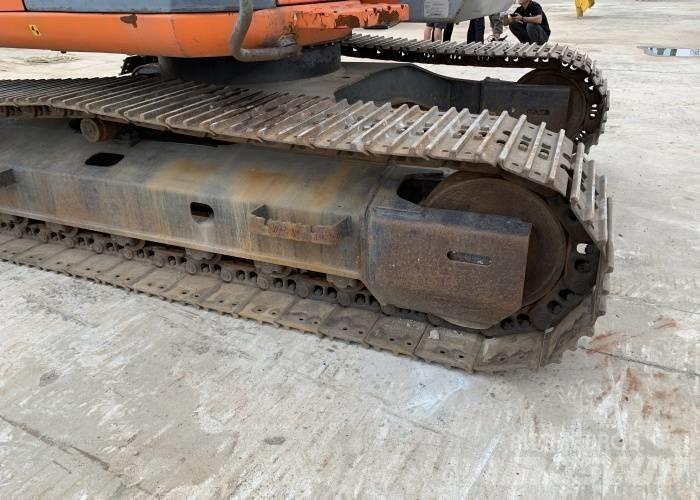 Hitachi ZX 125 Гусеничні екскаватори