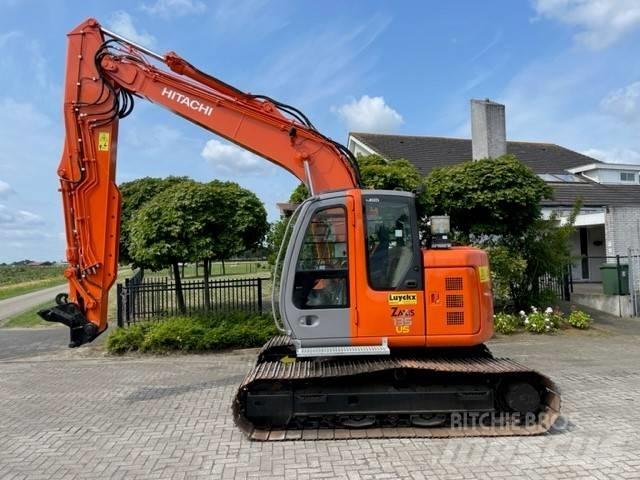 Hitachi ZX 135 US Гусеничні екскаватори