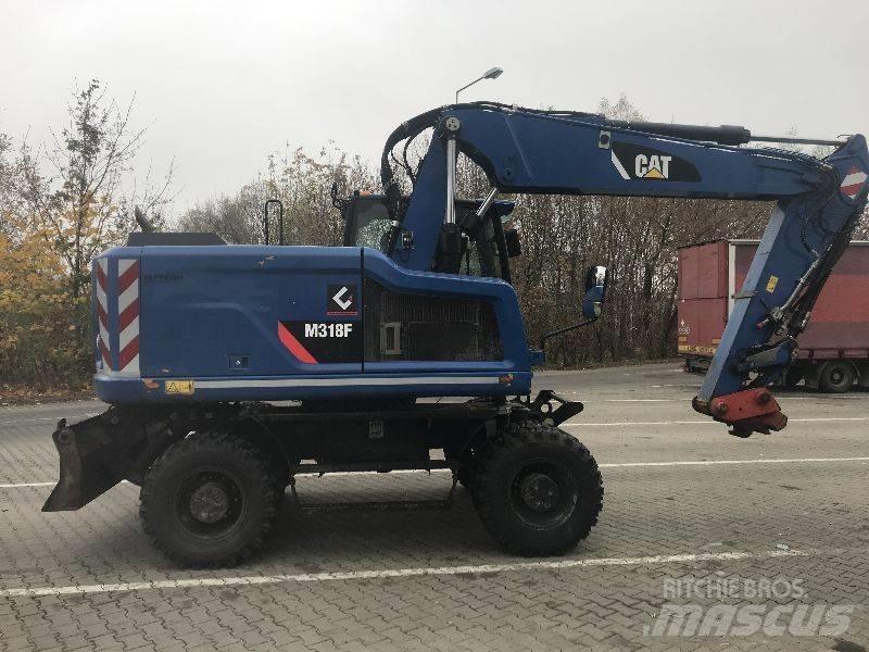CAT M318F Колісні екскаватори