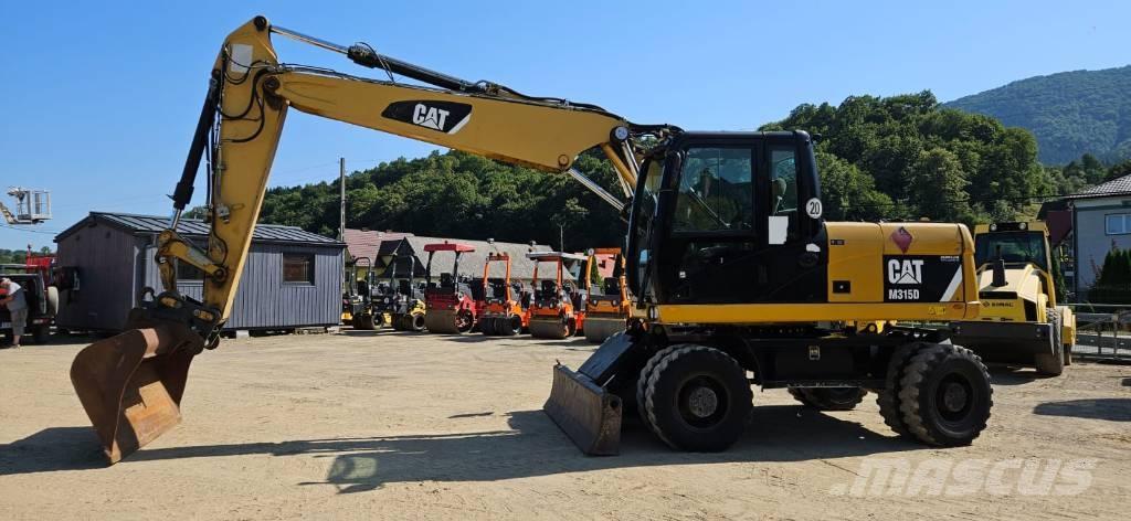CAT M 315 D Колісні екскаватори