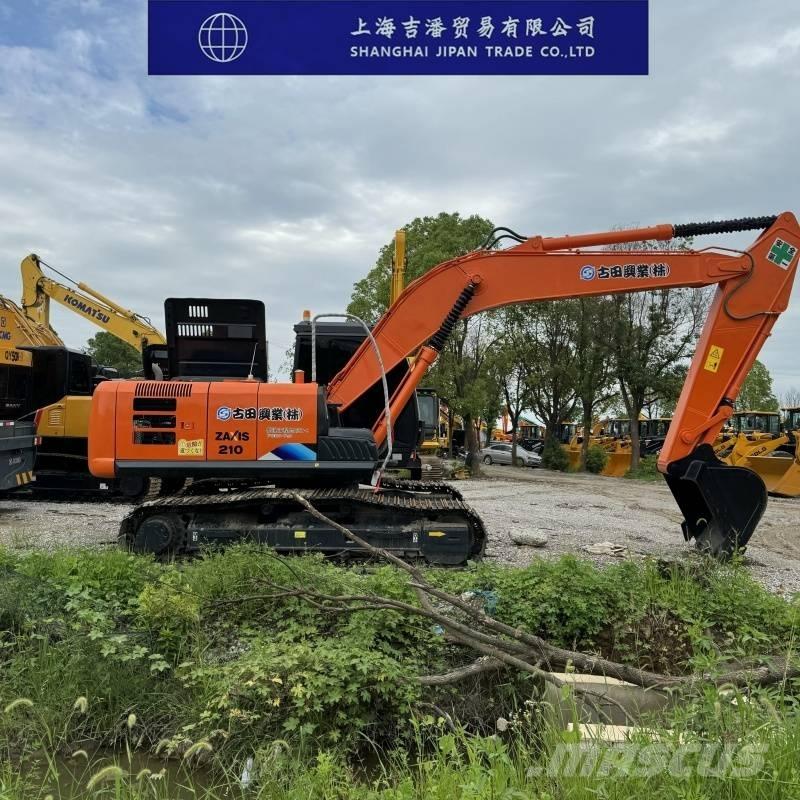 Hitachi ZX 210 Гусеничні екскаватори
