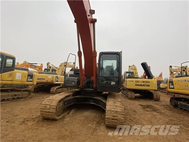 Hitachi ZX 210 Гусеничні екскаватори