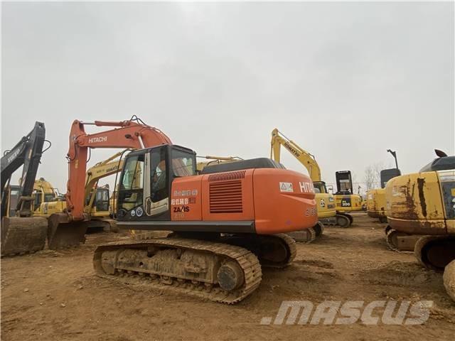 Hitachi ZX 210 Гусеничні екскаватори