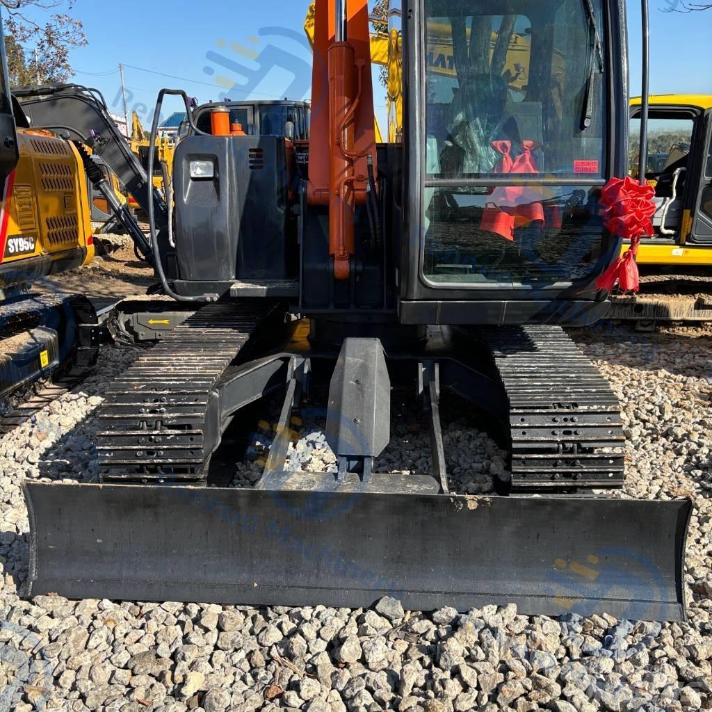 Hitachi ZX70 Міні-екскаватори < 7т