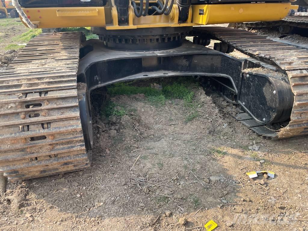 CAT 329 Гусеничні екскаватори