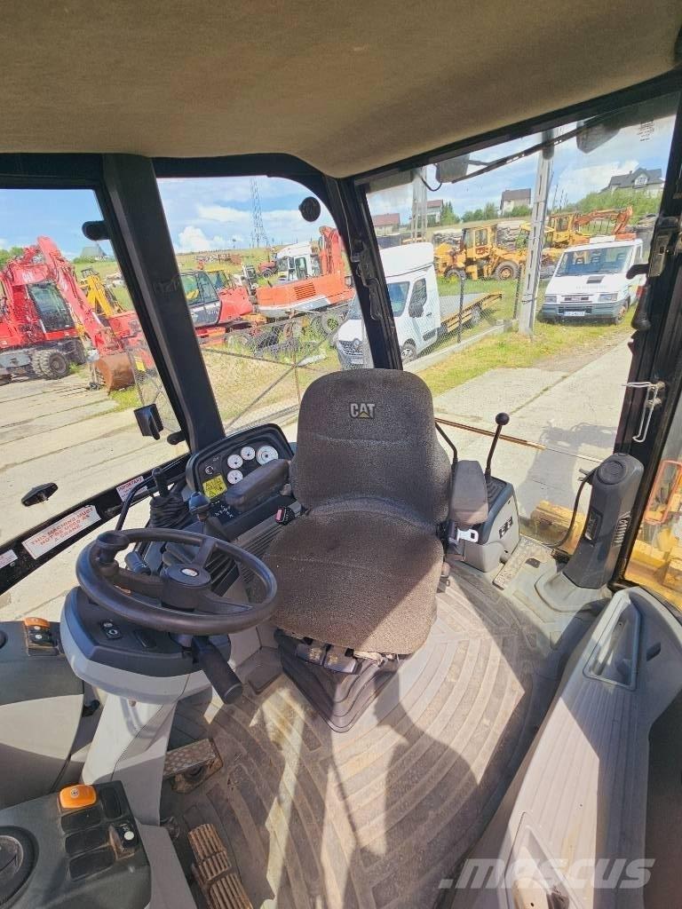CAT 428 E Екскаватори-навантажувачі