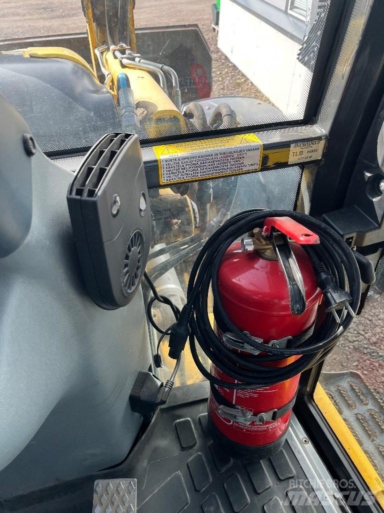 New Holland B 115 B Екскаватори-навантажувачі