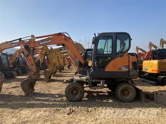 Doosan DX60W Колісні екскаватори