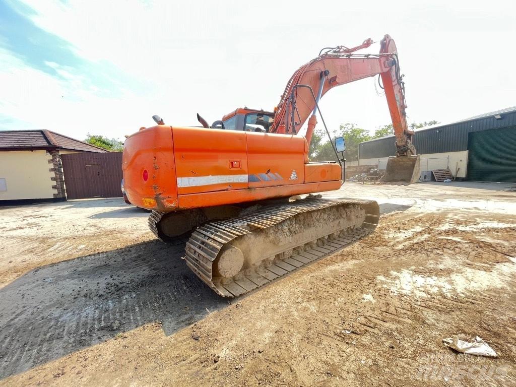 Doosan DX225 Колісні екскаватори