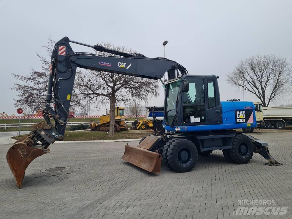 CAT M315D 2 buckets Колісні екскаватори