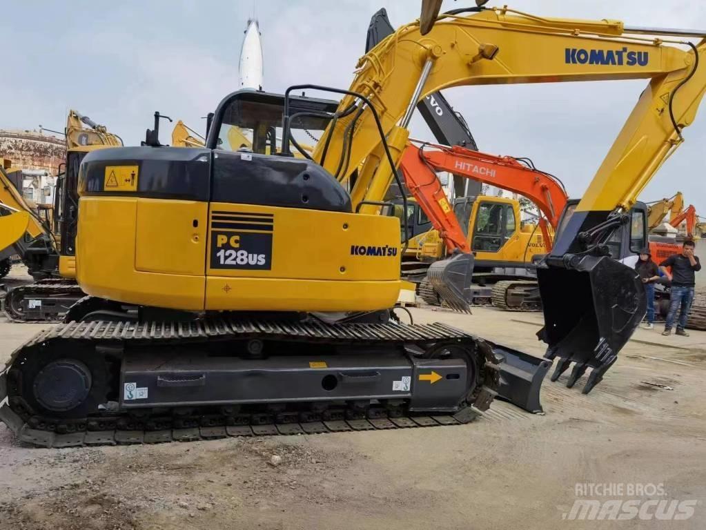 Komatsu PC 128US Середні екскаватори 7т. - 12т.