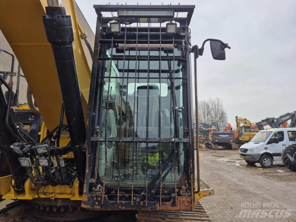 CAT 329E Гусеничні екскаватори