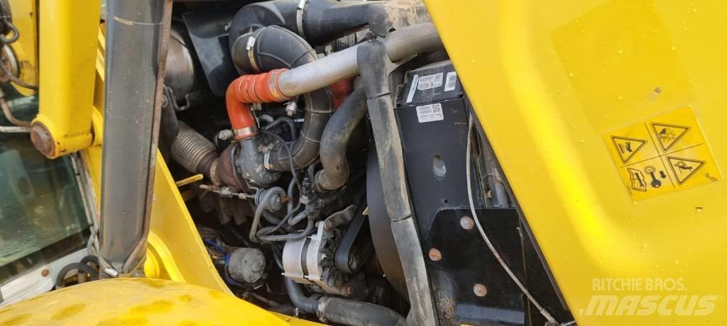 New Holland B 115 C Екскаватори-навантажувачі