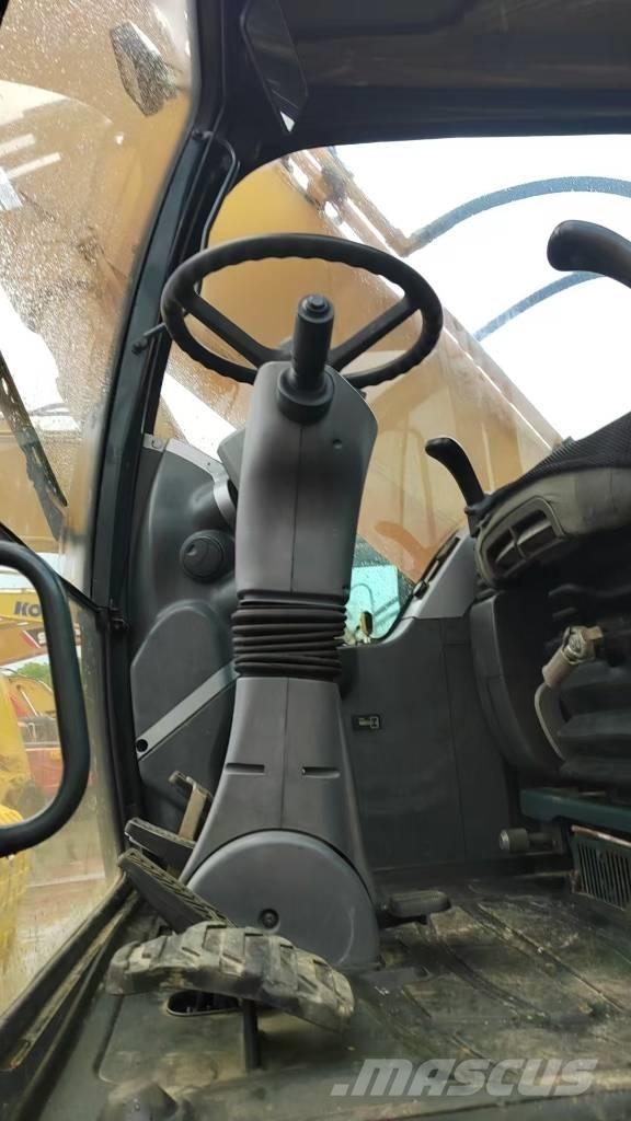 Hyundai 210W-9 Колісні екскаватори