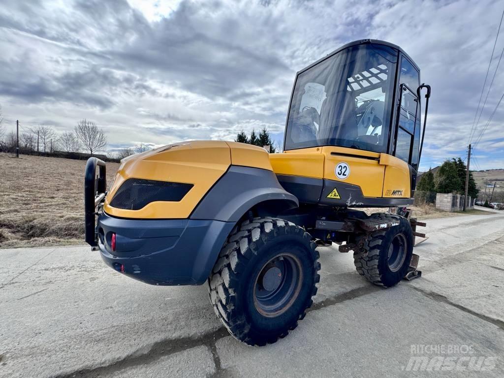 Mecalac 12 M TX Екскаватори-навантажувачі