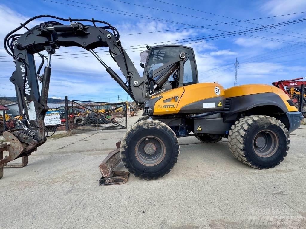 Mecalac 12 M TX Екскаватори-навантажувачі