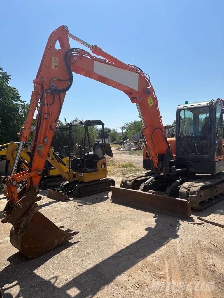 Doosan DX 80 R Середні екскаватори 7т. - 12т.