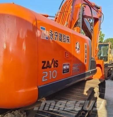 Hitachi ZX 210 Гусеничні екскаватори