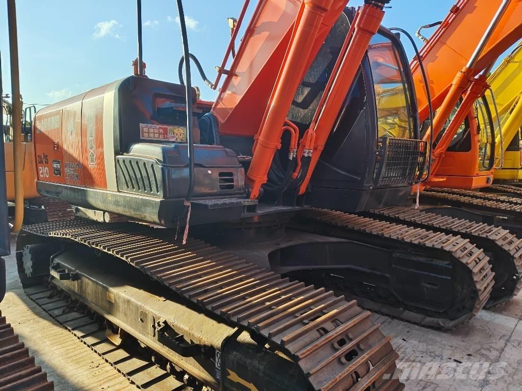 Hitachi ZX 210 Гусеничні екскаватори