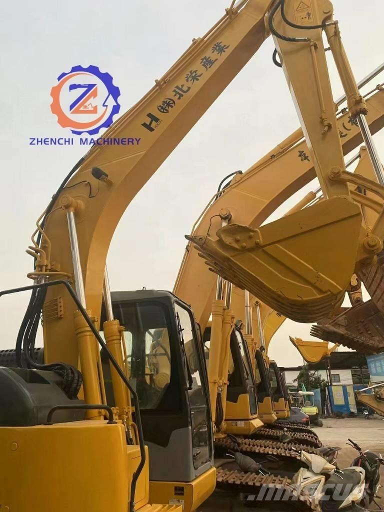 Komatsu PC 128 US Середні екскаватори 7т. - 12т.