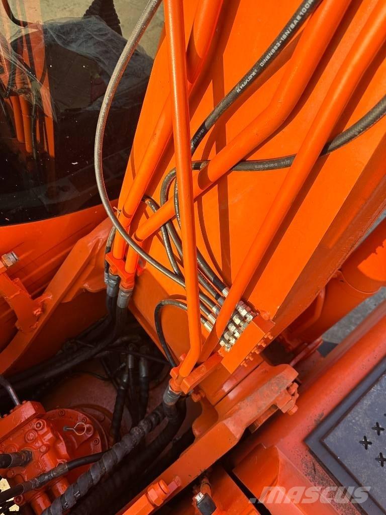 Doosan DX140 Гусеничні екскаватори