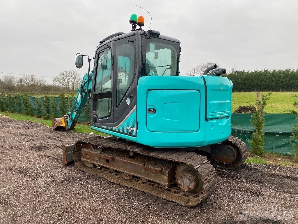 Kobelco Sk75 Середні екскаватори 7т. - 12т.