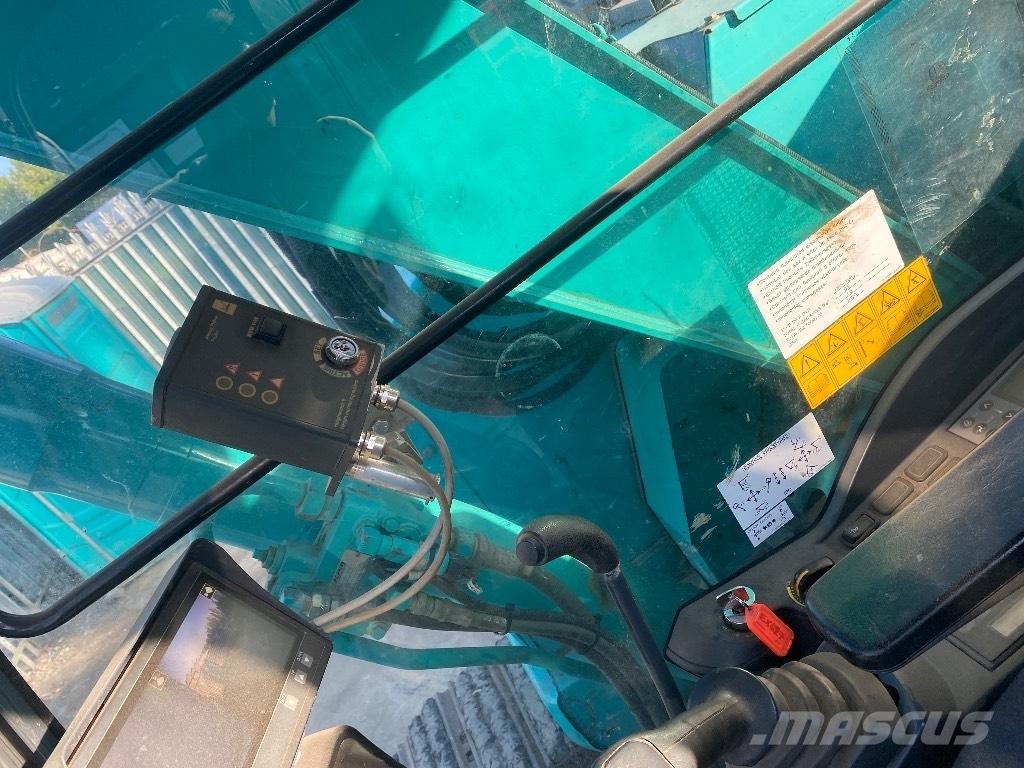 Kobelco Sk75 Середні екскаватори 7т. - 12т.