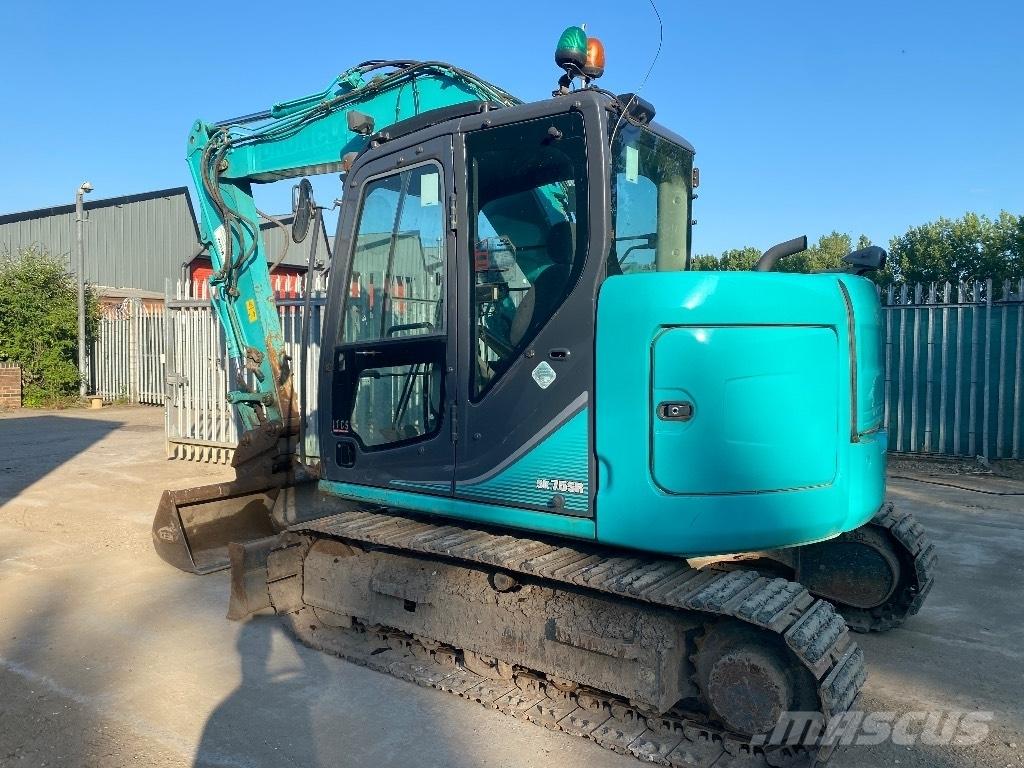 Kobelco Sk75 Середні екскаватори 7т. - 12т.