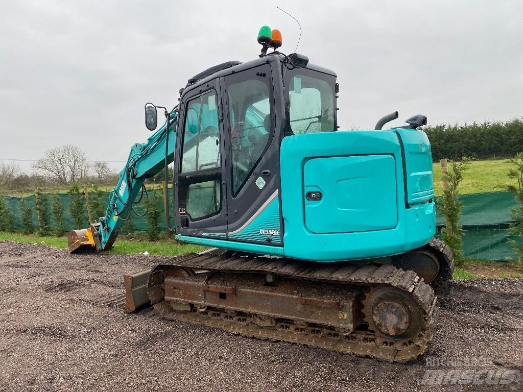 Kobelco Sk75 Середні екскаватори 7т. - 12т.