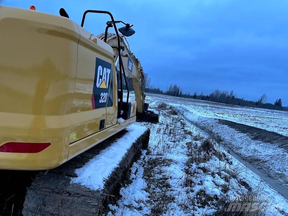 CAT 320 Гусеничні екскаватори