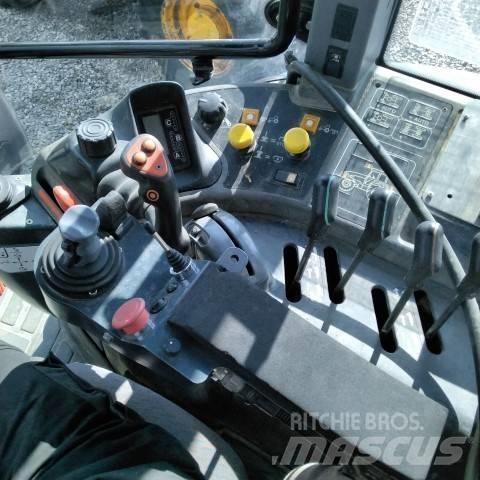 New Holland TM 165 Трактори