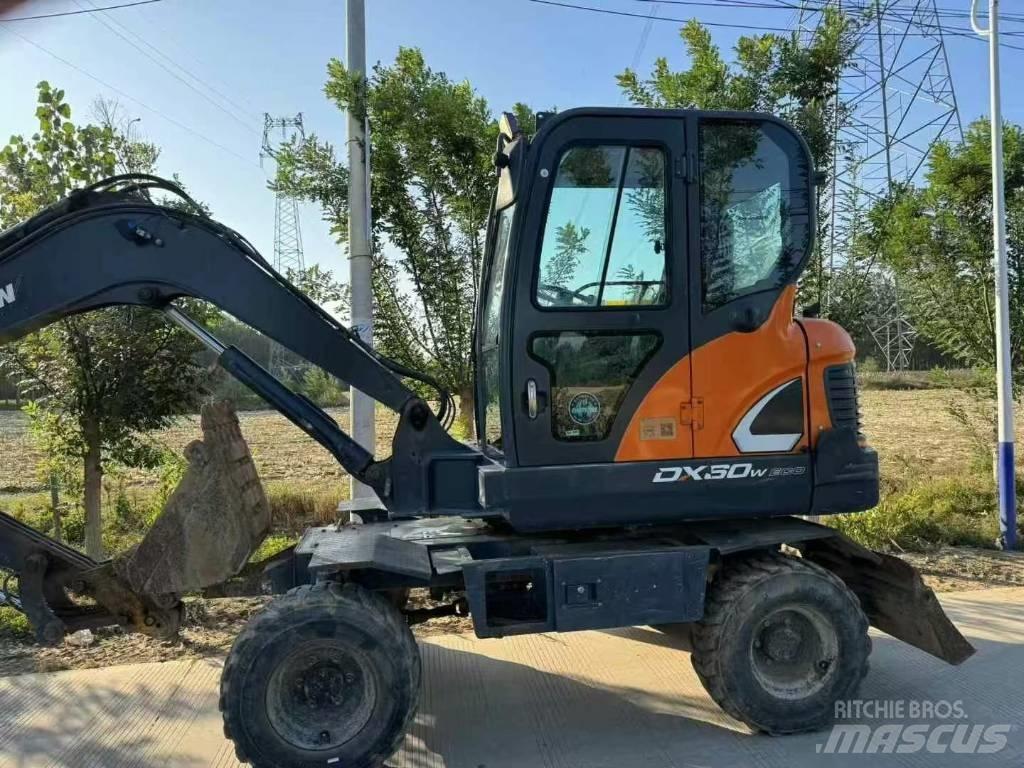 Doosan DX60W Колісні екскаватори