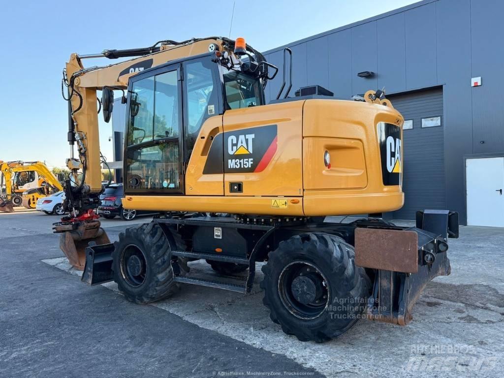 CAT M315F Колісні екскаватори