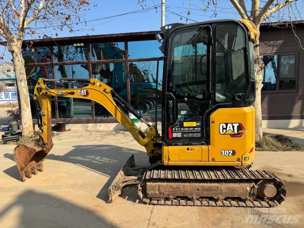 CAT 302 Гусеничні екскаватори