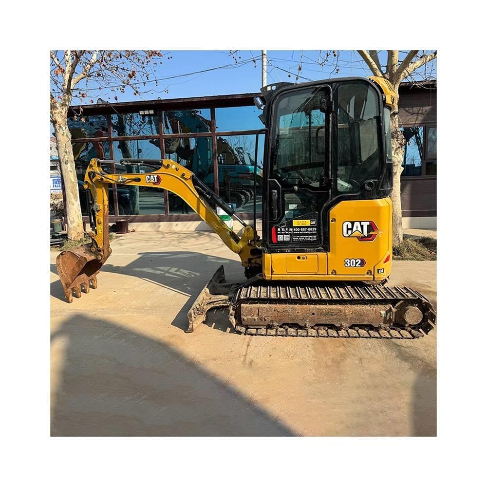 CAT 302 Гусеничні екскаватори