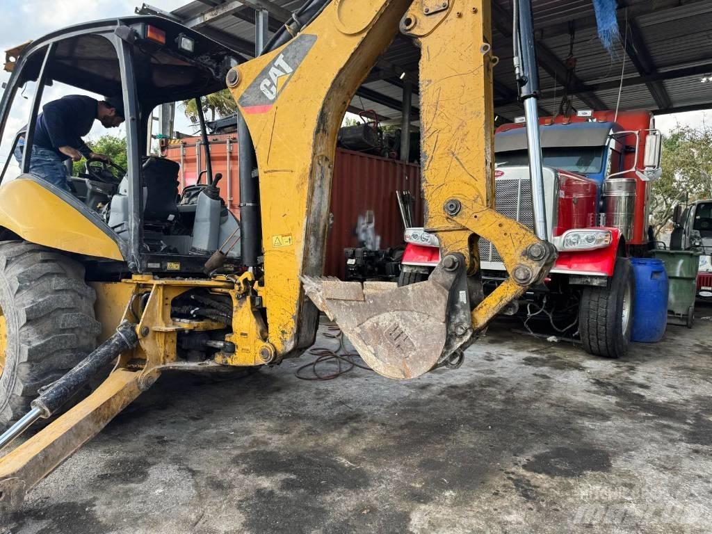 CAT 420 E Екскаватори-навантажувачі