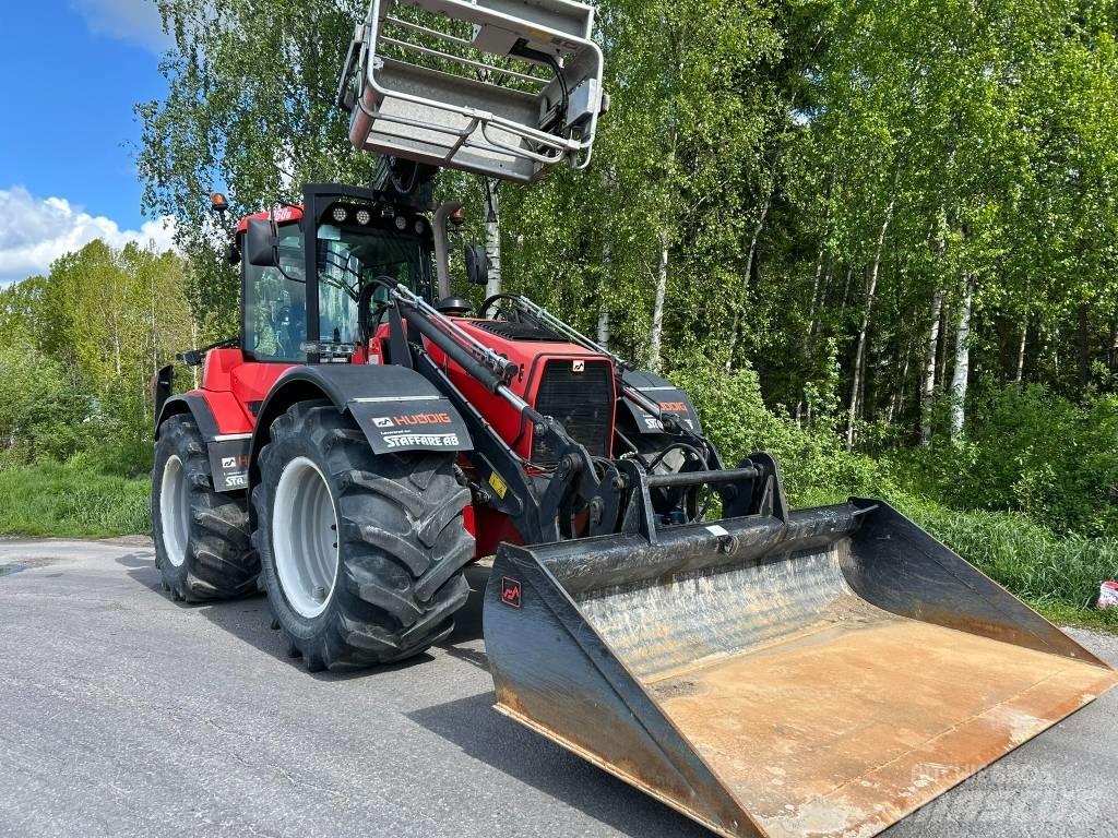 Huddig 1260 B Екскаватори-навантажувачі