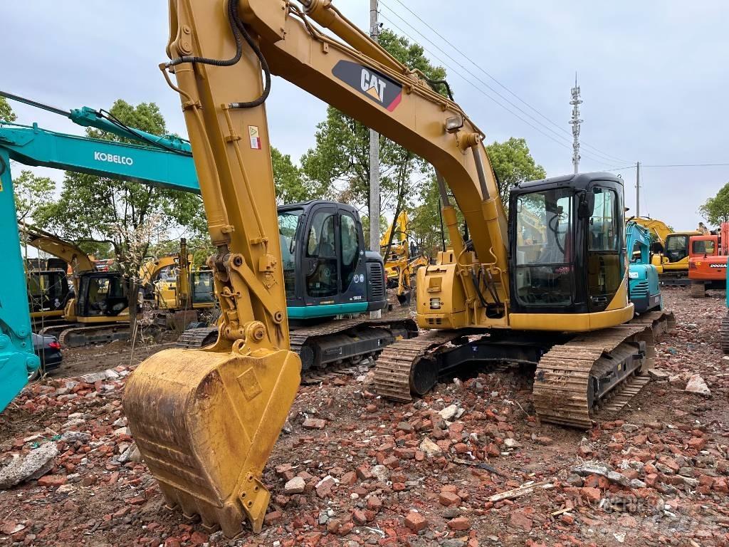 CAT 313C Гусеничні екскаватори
