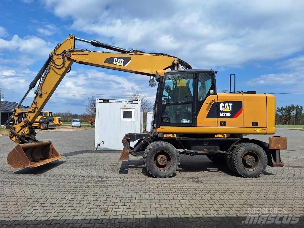 CAT M 318 F Колісні екскаватори