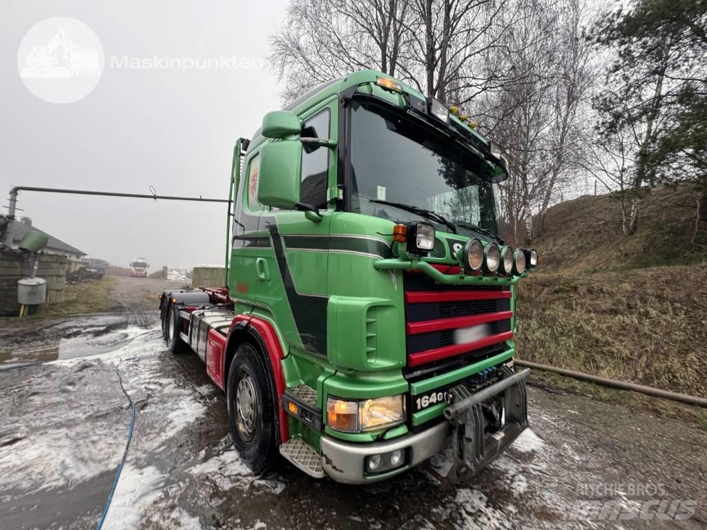 Scania R 164-580 Вантажівки з гаковим підйомом
