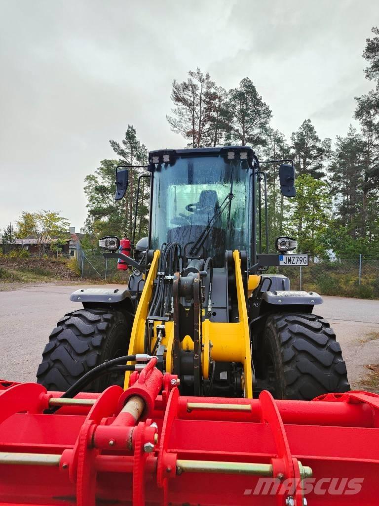 New Holland W 110 D Фронтальні навантажувачі