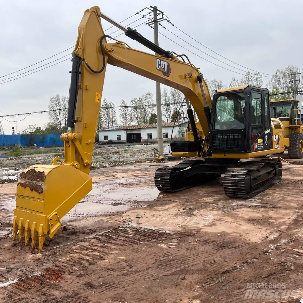 CAT 312 D Гусеничні екскаватори