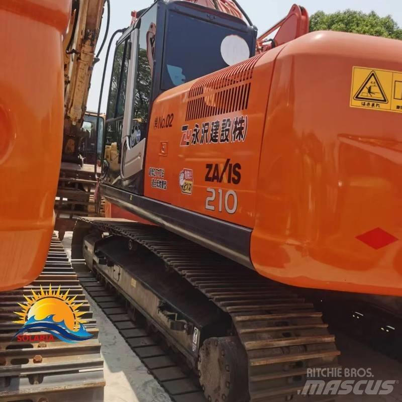 Hitachi ZX 210 Гусеничні екскаватори