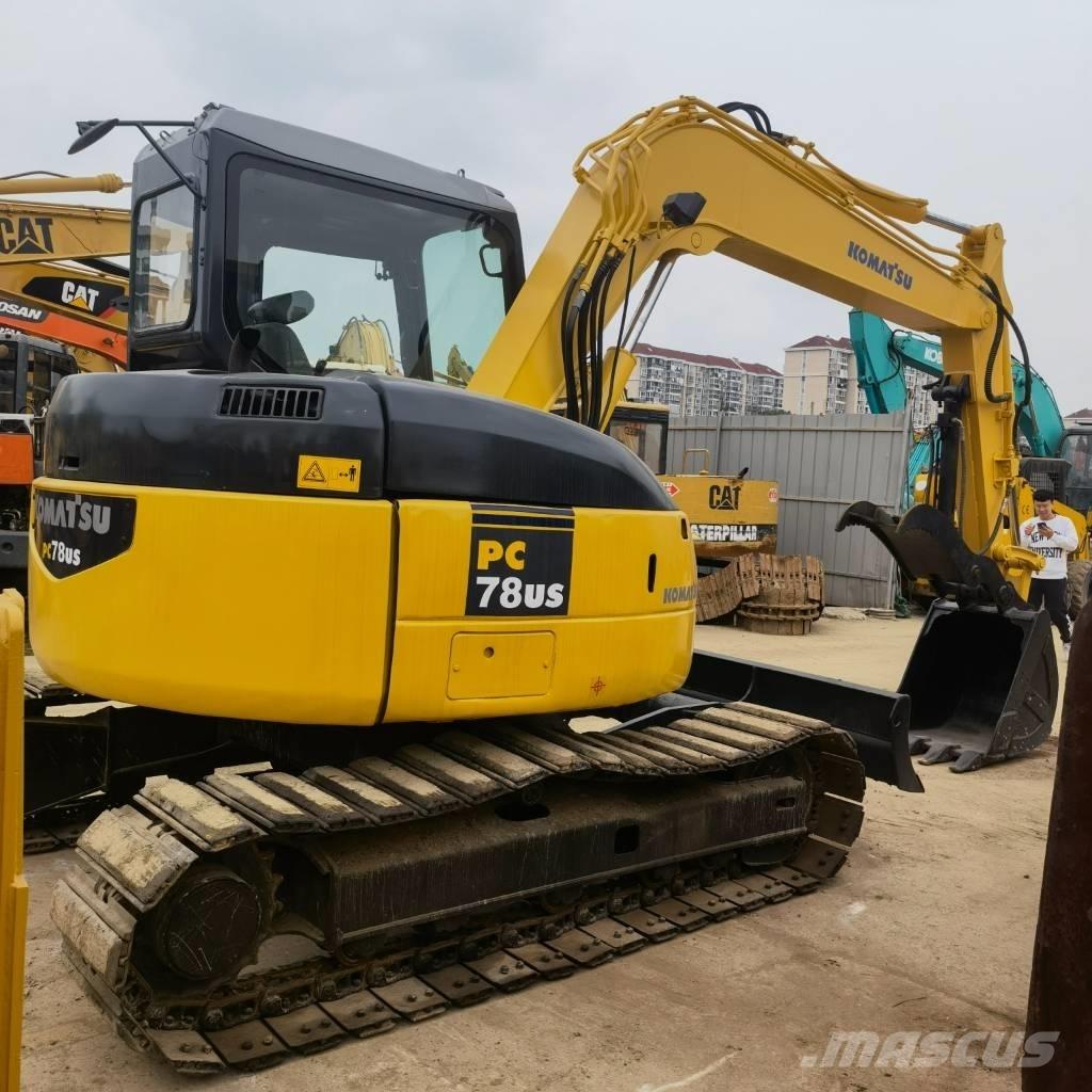 Komatsu PC78US Середні екскаватори 7т. - 12т.
