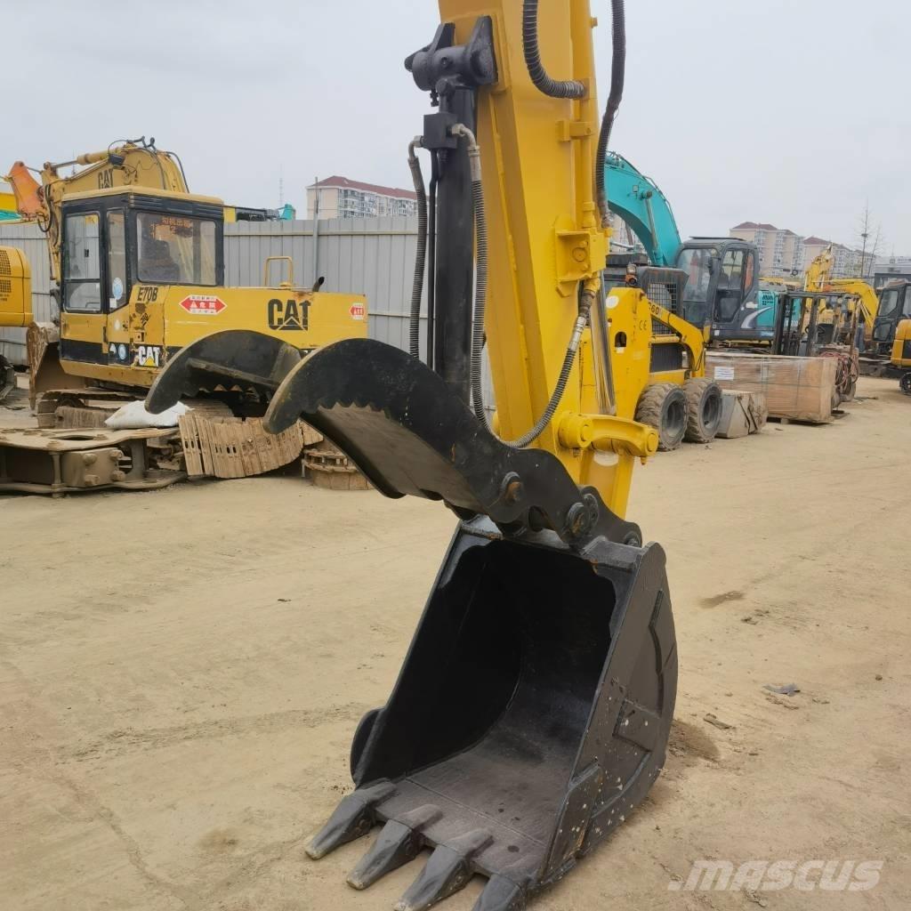 Komatsu PC78US Середні екскаватори 7т. - 12т.