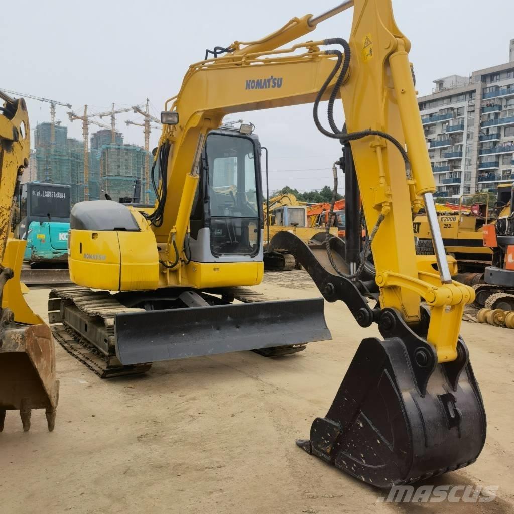 Komatsu PC78US Середні екскаватори 7т. - 12т.