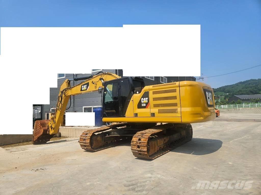 CAT 330 Гусеничні екскаватори