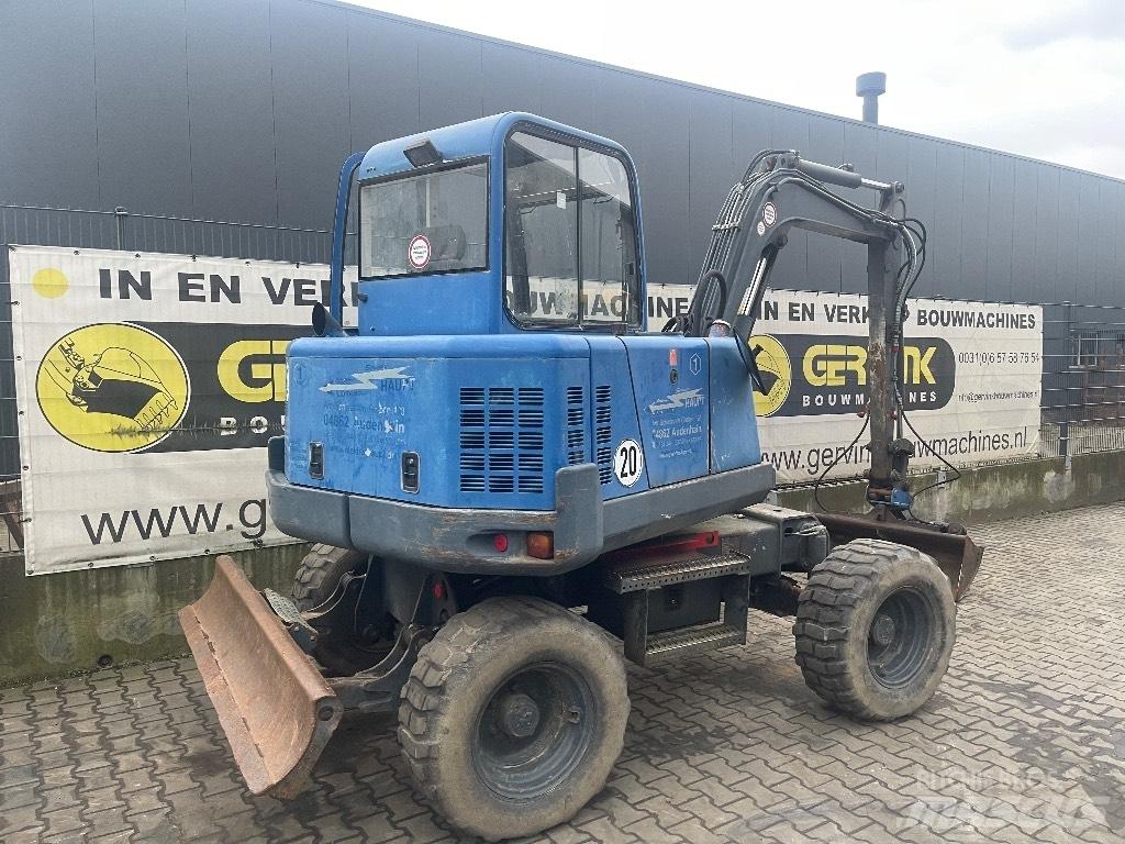  Peljop EW 256 Колісні екскаватори