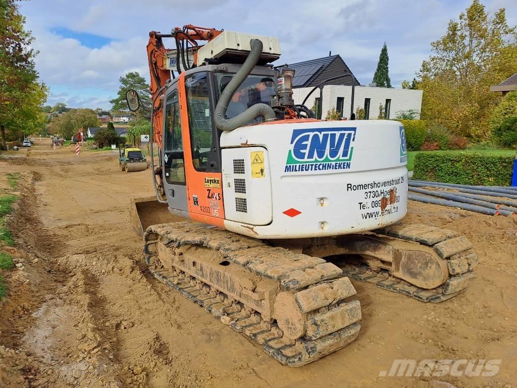 Hitachi ZX135US Гусеничні екскаватори