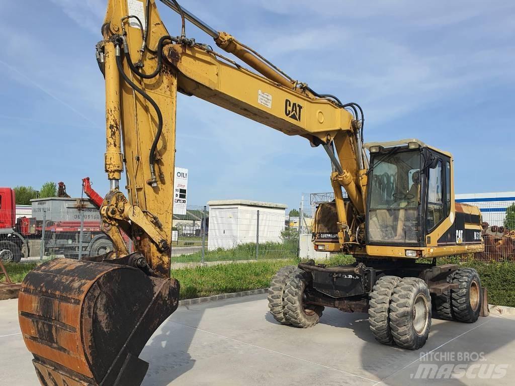 CAT M 318 Колісні екскаватори